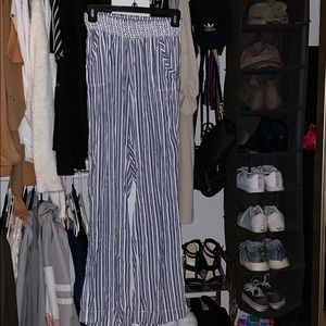Loose stripped pants.